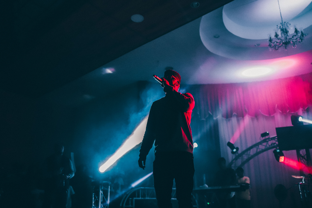 Three football players who are also singers